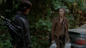 Carol and Daryl prep an emergency car in Strangers