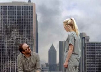 Beth speaks to Dr. Steven Edwards on the rooftop of Grady Memorial Hospital
