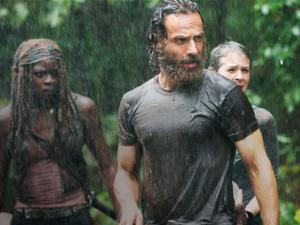 Rick and his group welcome the rain in the Walking Dead episode "Them"