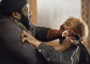 Tyreese fights a walker in The Walking Dead premiere episode "What Happened and What's Going On"